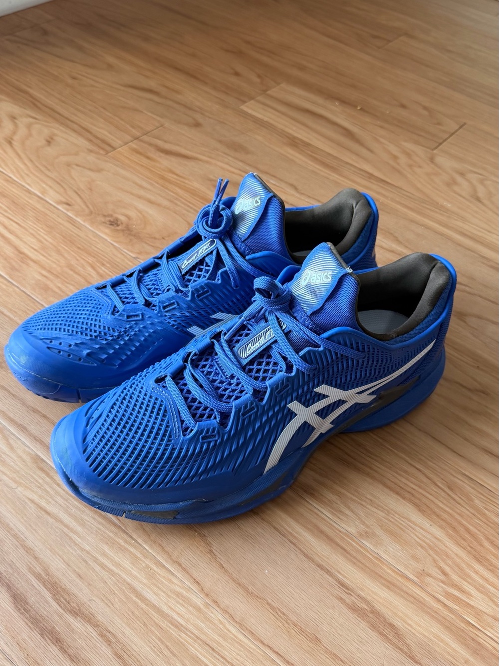 ASICS Men's Athletic Shoes in Bright Blue with White Logo